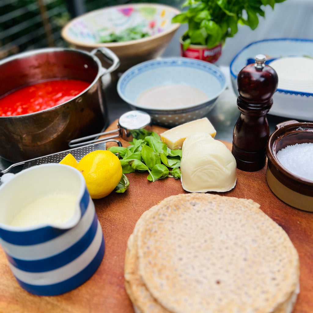Spinach and ricotta crespelle baked in tomato sauce – Italian meal delivery Northern Rivers