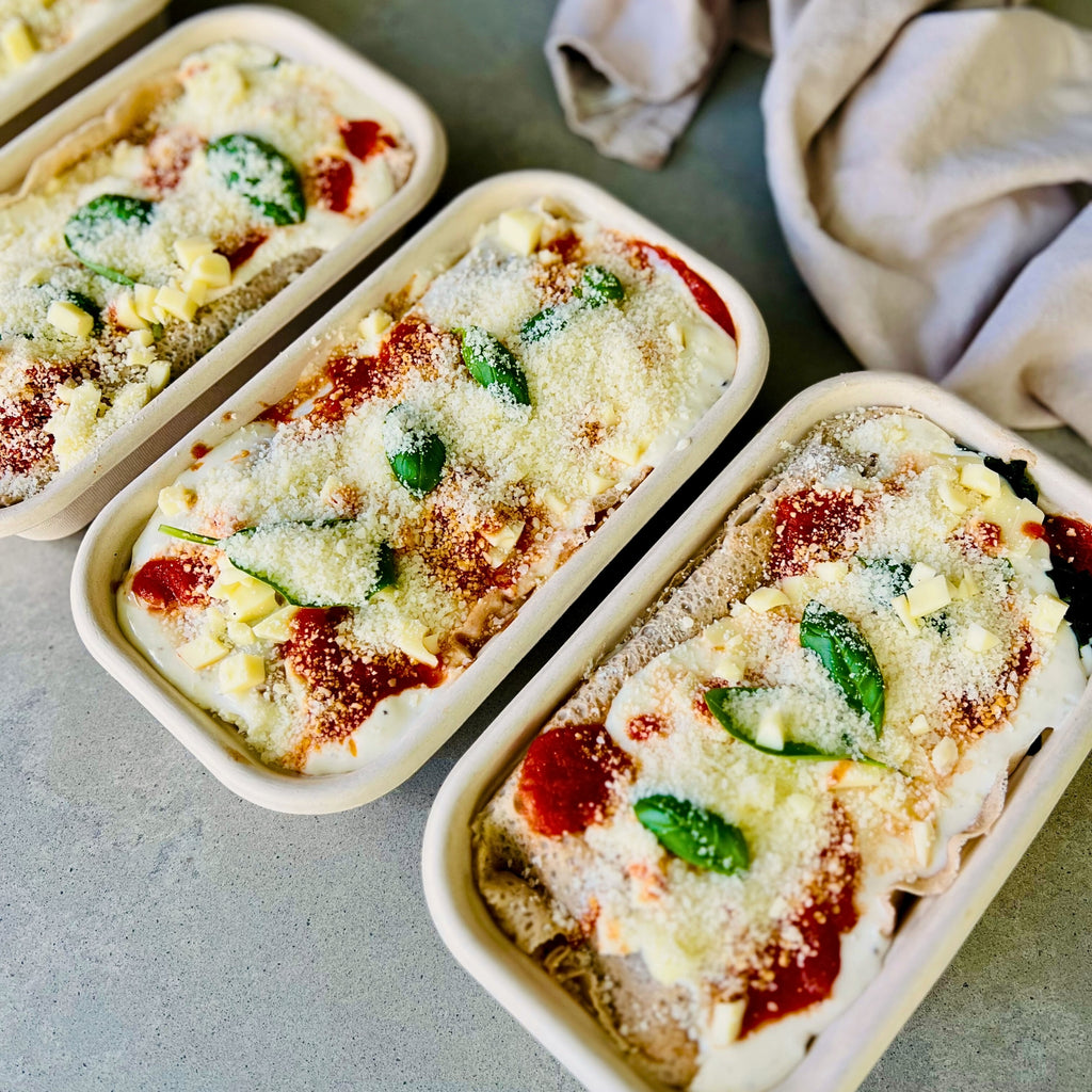 Spinach and ricotta crespelle baked in tomato sauce – Italian meal delivery Northern Rivers