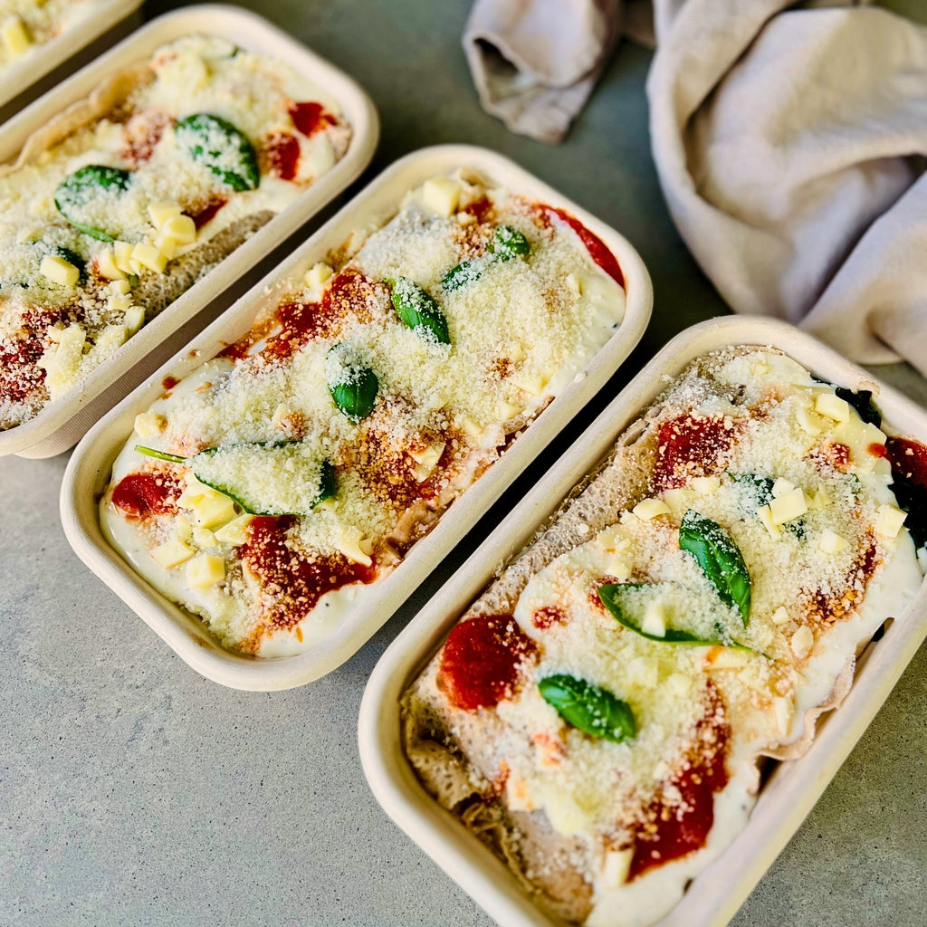 Spinach and ricotta crespelle baked in tomato sauce – Italian meal delivery Northern Rivers